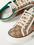 GUCCI
Tennis 1977 logo-embroidered canvas sneakers